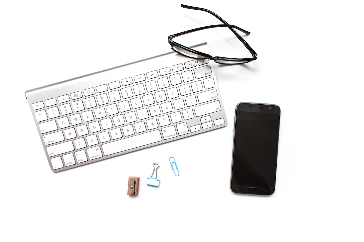 Glasses, phone, keyboard - digital declutter tools.