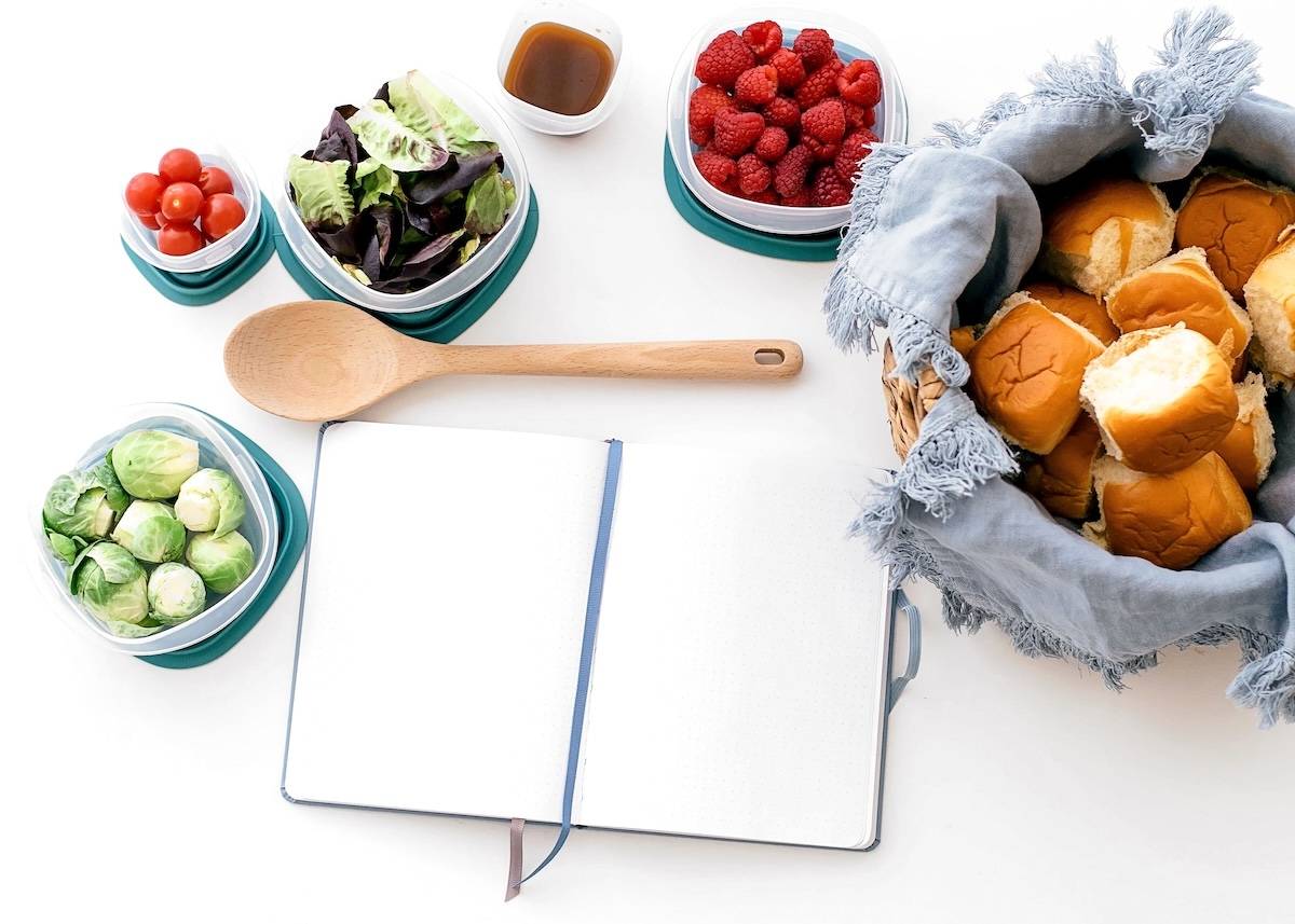 Food in containers, notepad - items to help with family routines.