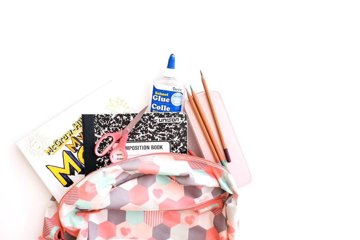 School bag with stationery - items to help with family routines.