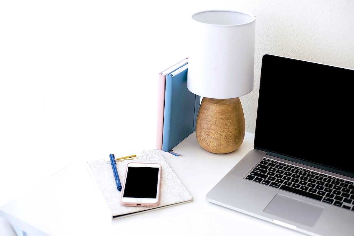 Computer and notepad on desk - things you can do in 20 minutes.