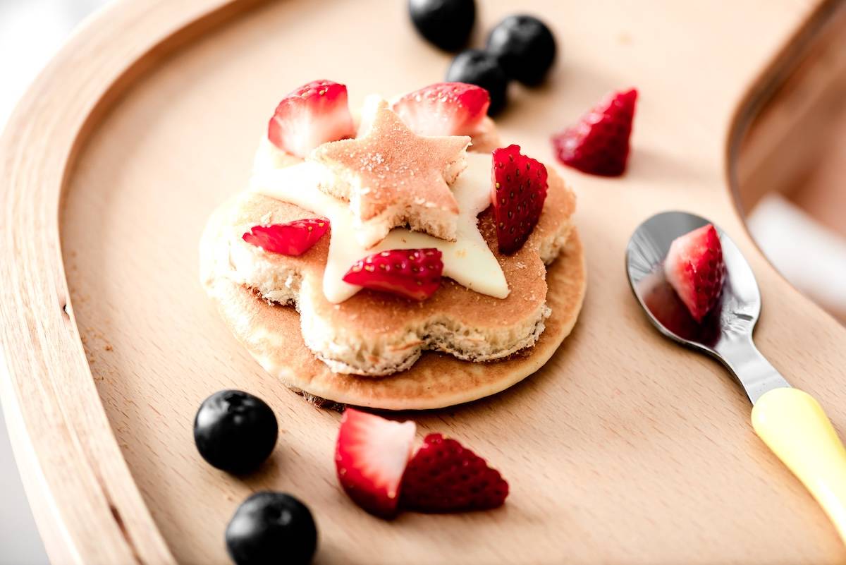 Pancakes decorated with fruit and cheese star - a snack station idea.