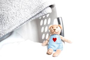 Laundry hamper with toy - laundry hacks.