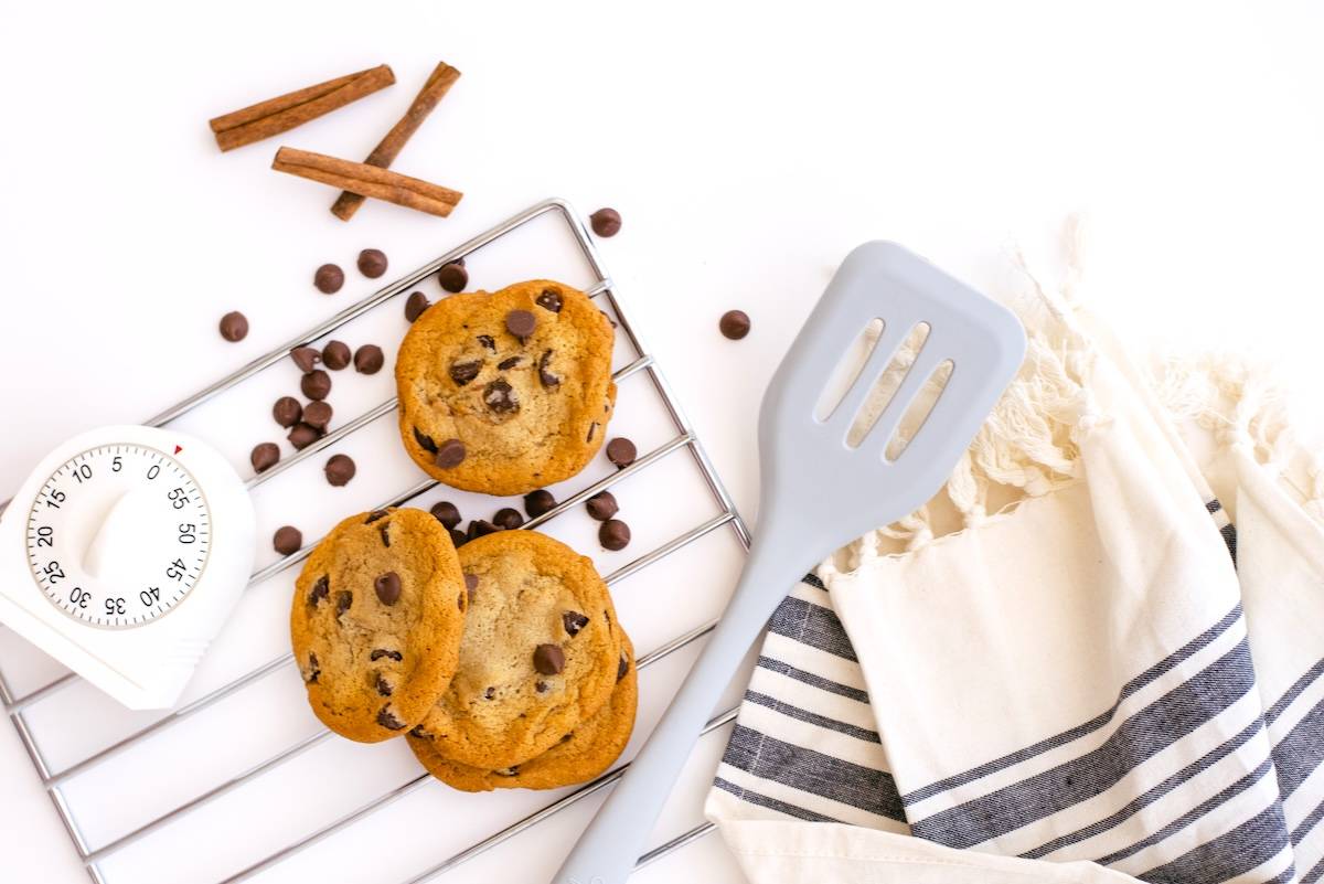 Cookies, baking utensils, timer - family batch cooking recipe.
