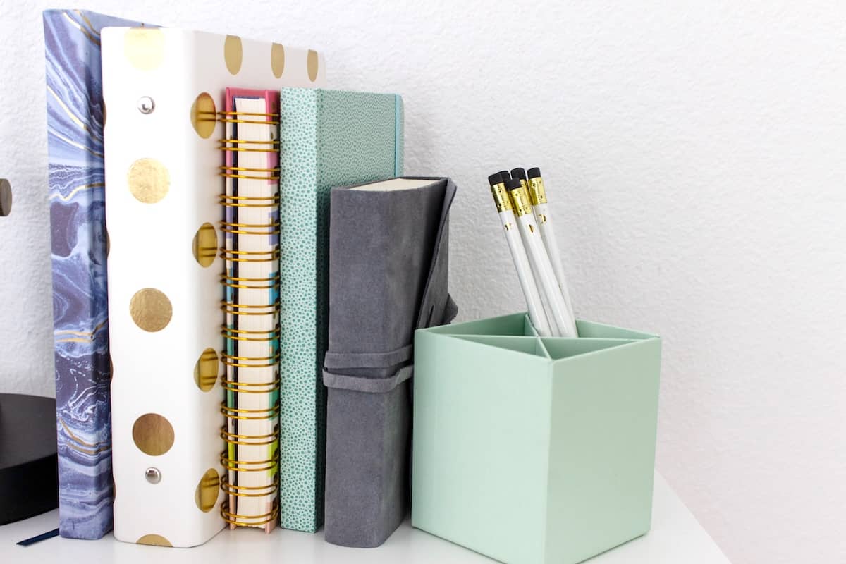 5 notebooks, pencils, pencil holder - how to use family calendars.