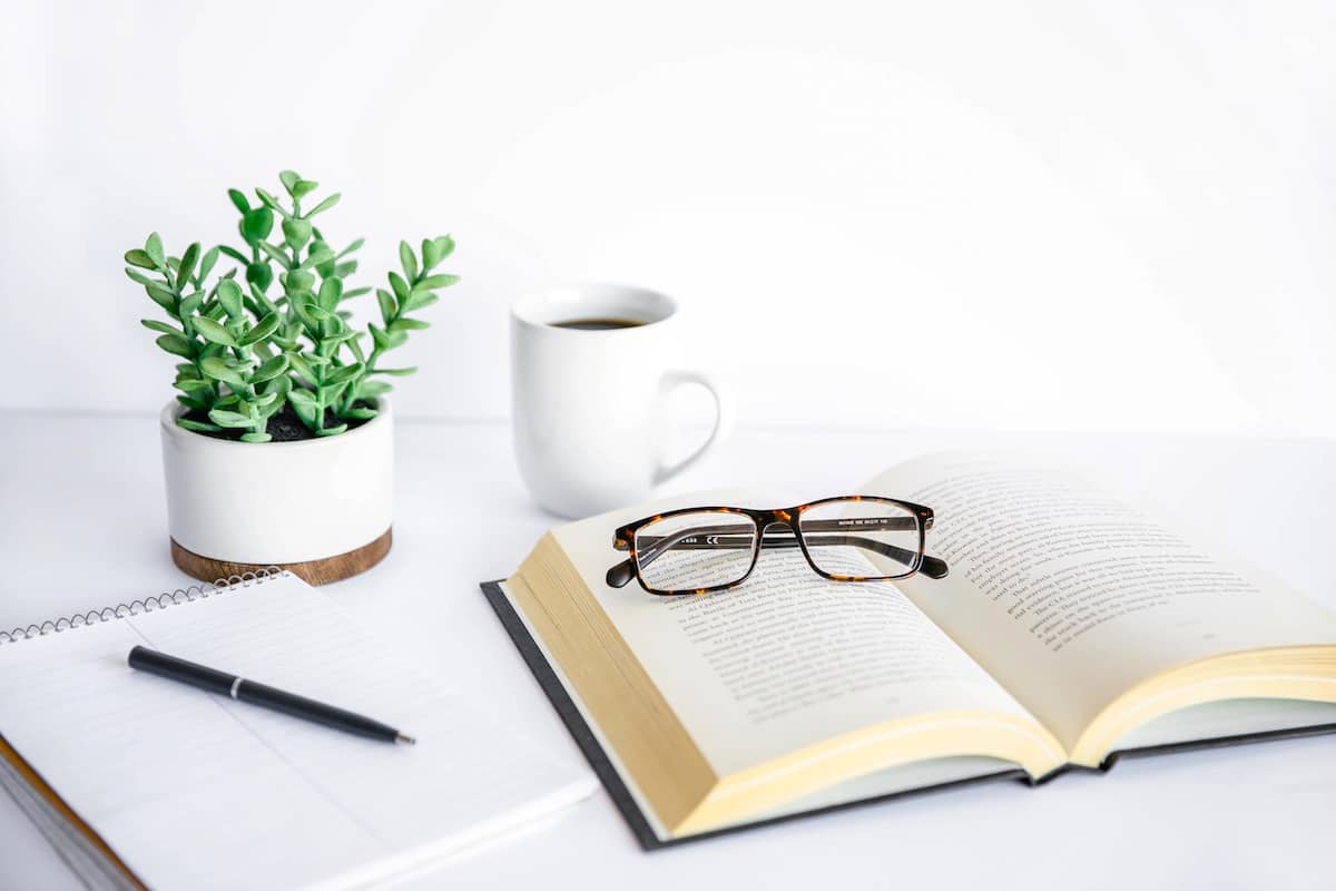 Plant, glasses, book - write a to do list.