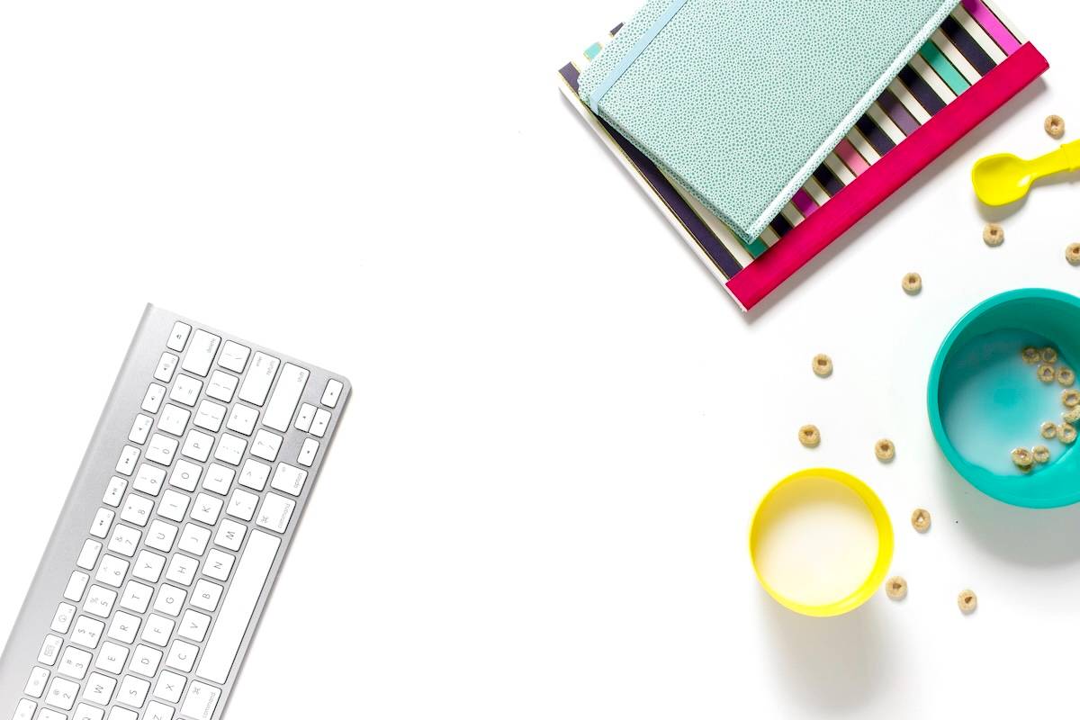 Keyboard, planners, kid's breakfast - family organisation items.