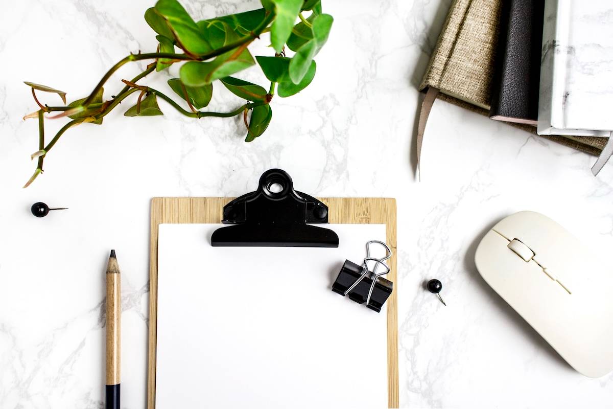 Stationery, mouse, plant - tips for how to be productive.