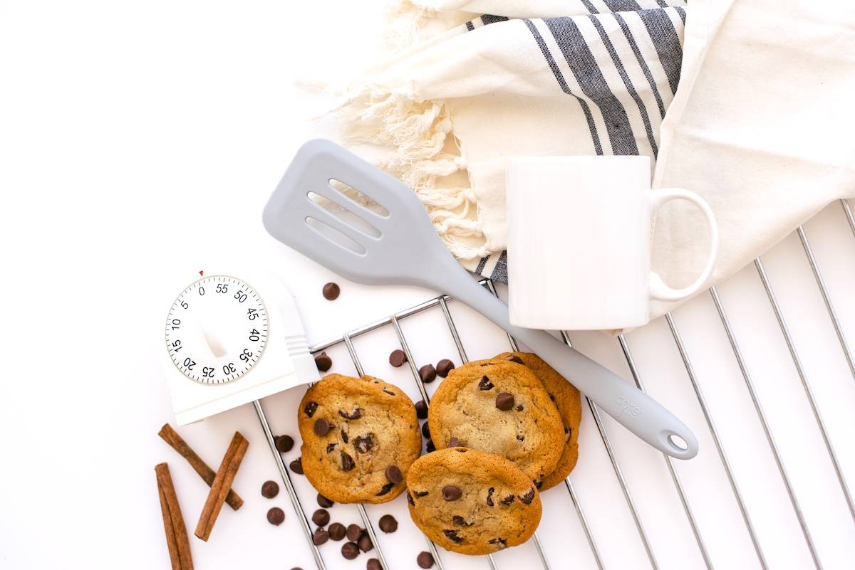Baking utensils, timer, apron - items needed for family meal planning.