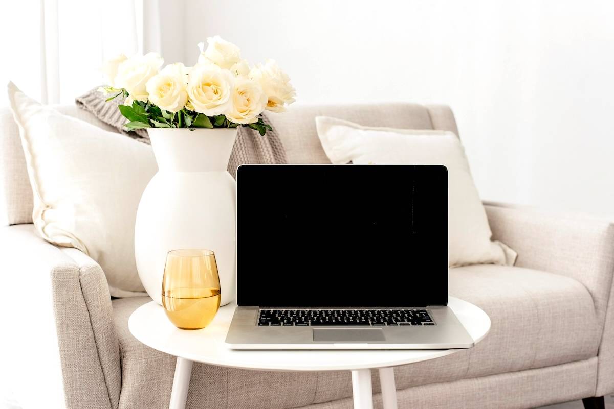 Flowers, sofa, laptop - how to declutter when overwhelmed.