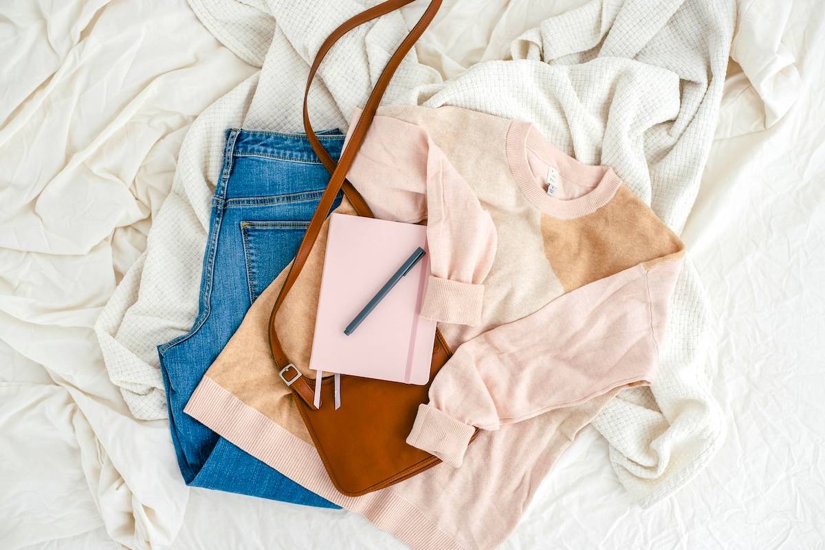 Clothing, notepad - items needed for a realistic evening routine.